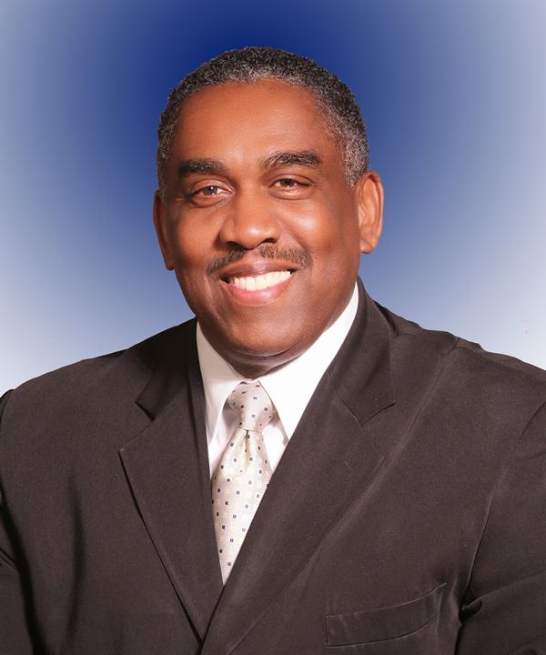 Commissioner M. Carn